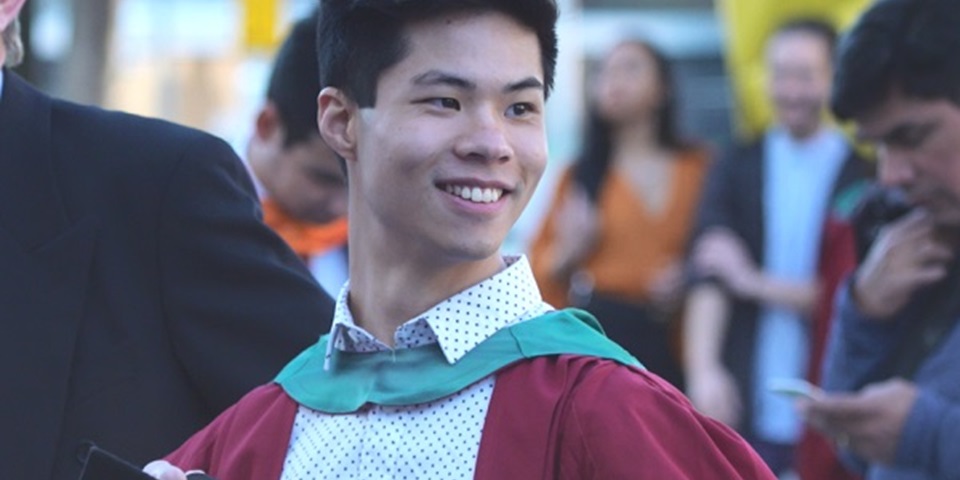 A Murdoch University graduate wearing his academic regalia