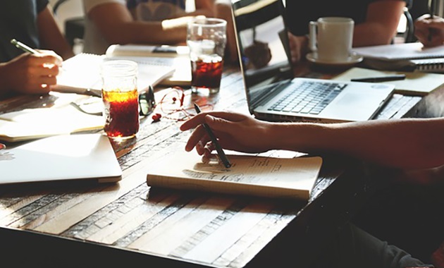 Young professionals around a table