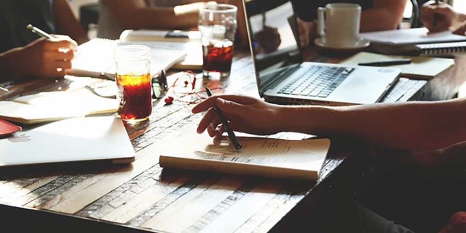 Young professionals around a table