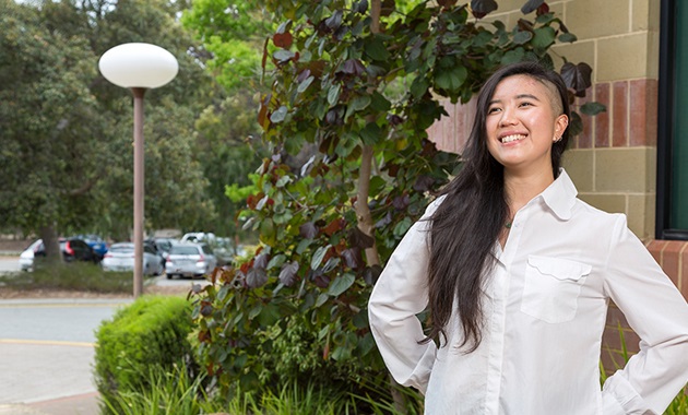 International student Chantal Ng posing and smiling at Murdoch University