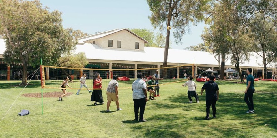 Murdoch University students enjoying a game of volleyball