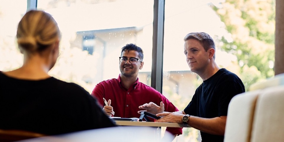 Business people have a meeting in a cafe