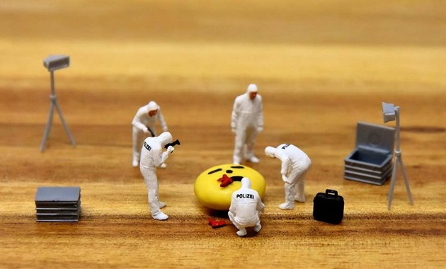 Toy figurines arranged in a crime scene