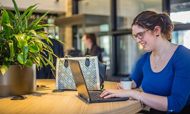 Erin Horrigan working on laptop at Murdoch University