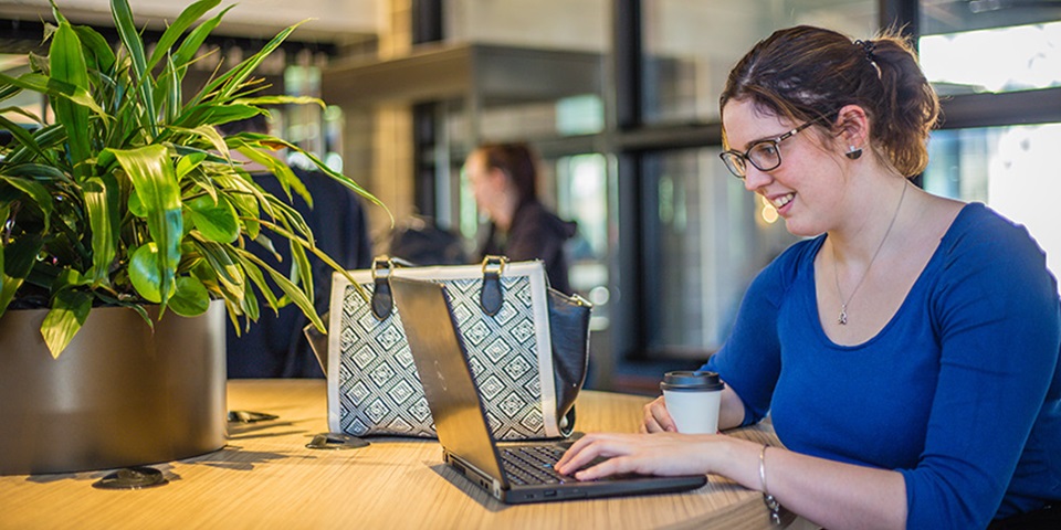 Erin Horrigan working on laptop at Murdoch University