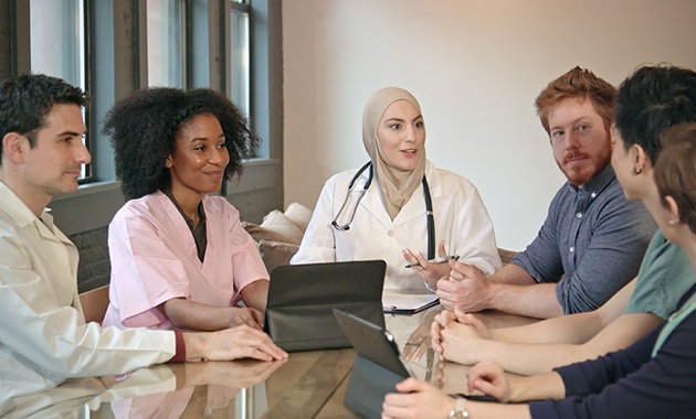 Group of healthcare workers having a discussion