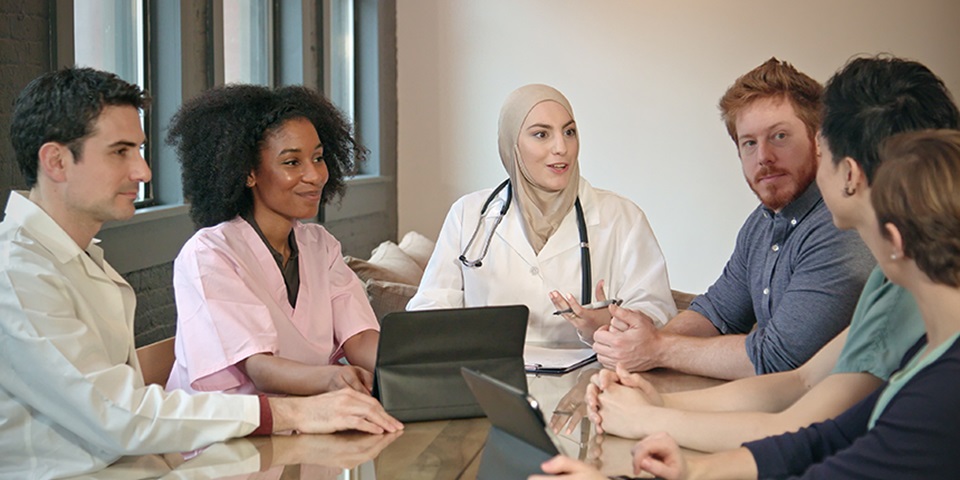 Group of healthcare workers having a discussion