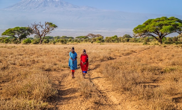 Maasai women crossing the savannah