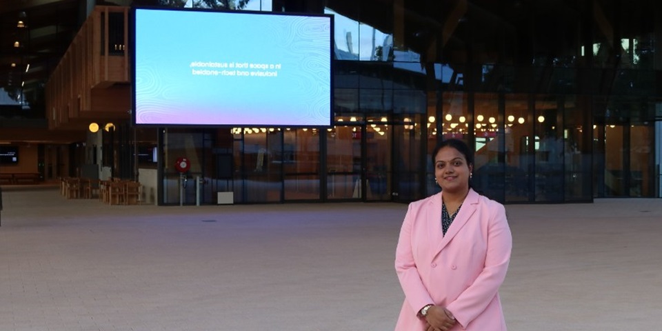 Jyothi standing in front of Boola Katitjin