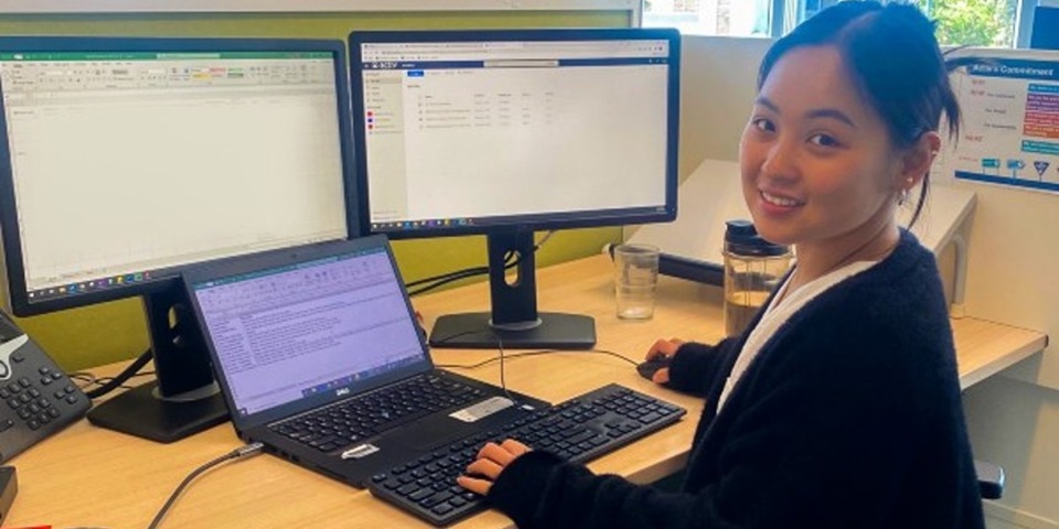 Murdoch student sitting at desk