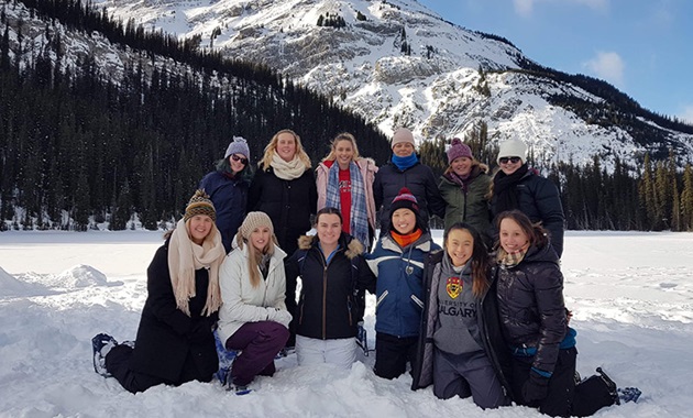 Lucy with friends in snow in Canada