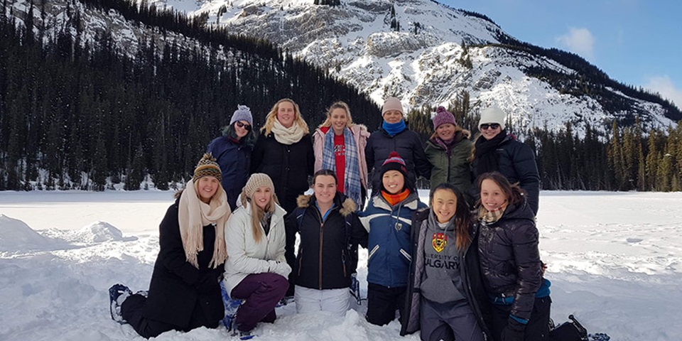 Lucy with friends in snow in Canada