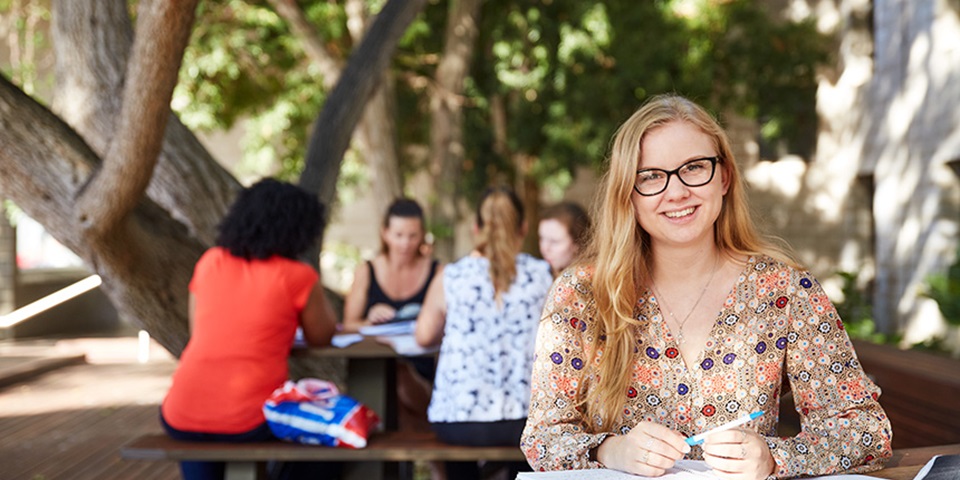 marketing student studying outdoors