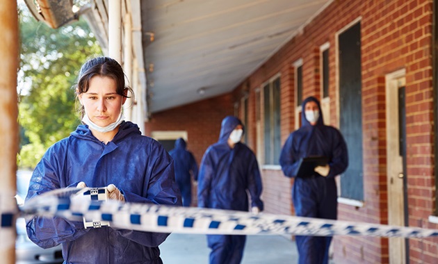 Murdoch students work at simulated crime scene.