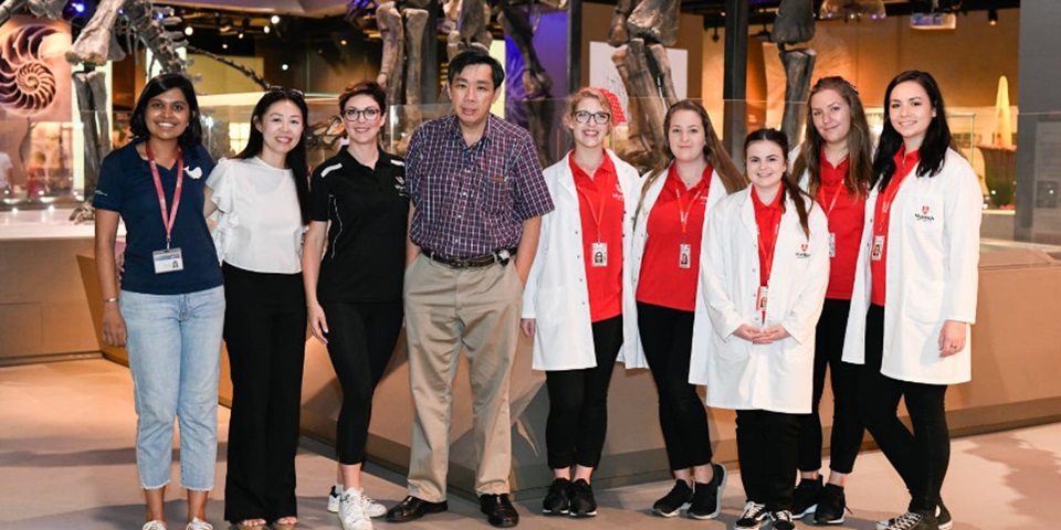 Murdoch students and staff with representatives of the Lee Kong Chian Natural History Museum in Singapore