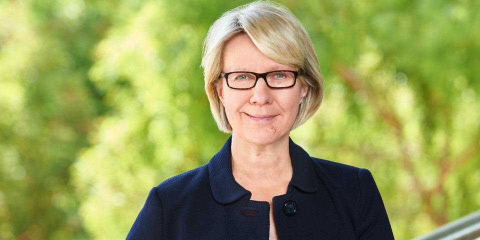 Professor Eeva Leinonen with vegetation in background