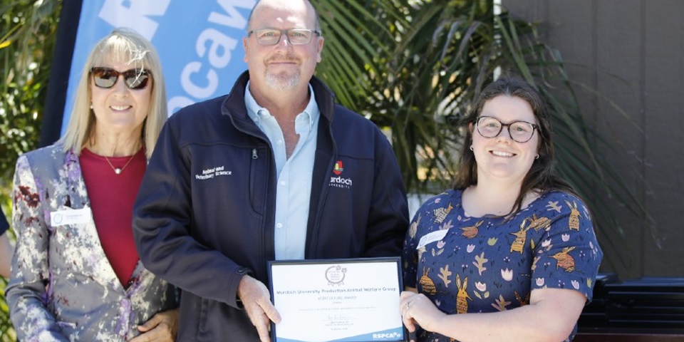 Lynne Bradshaw (RSPCA WA Chair), Assoc. Prof. David Miller and Dr Emily Taylor holding the RSPCA Agriculture Award certificate