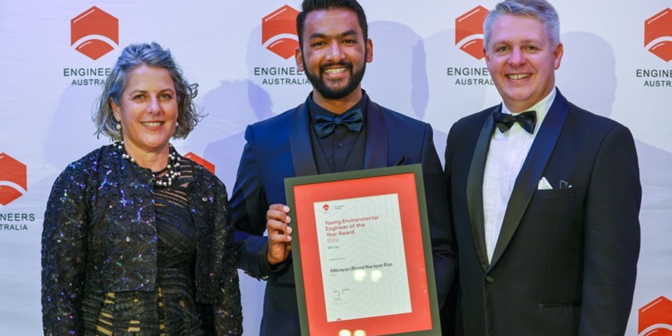 Group photo of Mitrayan (Ryan) Rao (standing in the middle holding his award) with Dr Nick Fleming (on the right) and CEO of Engineering Australia Romilly Madew (on the left)