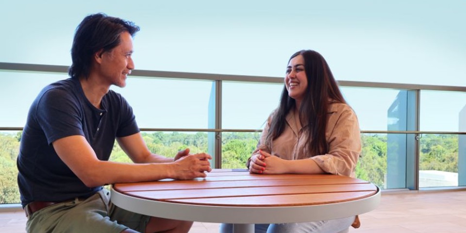 Psychology student Sudaba Faroughi speaking with Psychology Senior Lecturer, Dr Hakuei Fujiyama