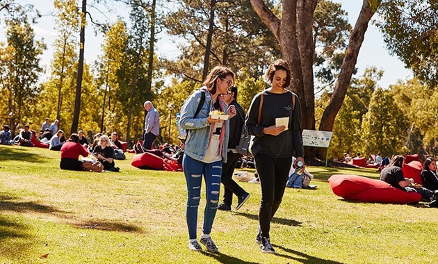 Students walking across Bush Court