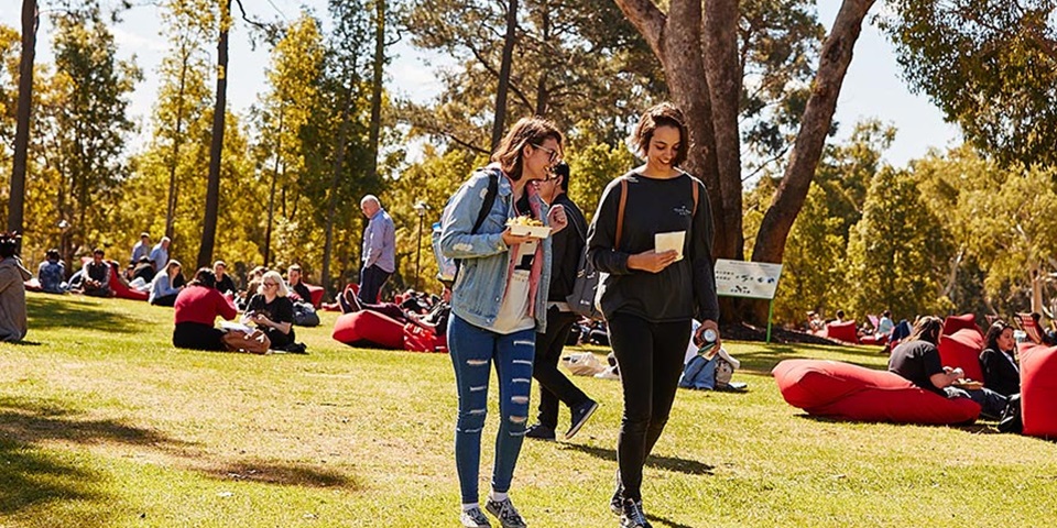 Students walking across Bush Court