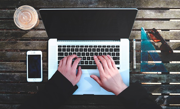 Bird's eye view of person using a laptop